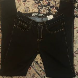 Machine stretchy dark blue skinny’s